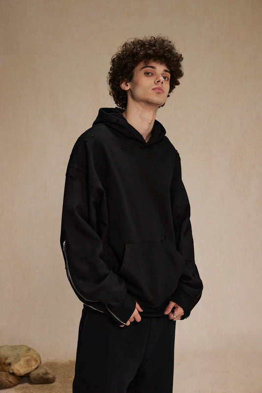 A woolen loop hoodie with a zipper on the sleeve