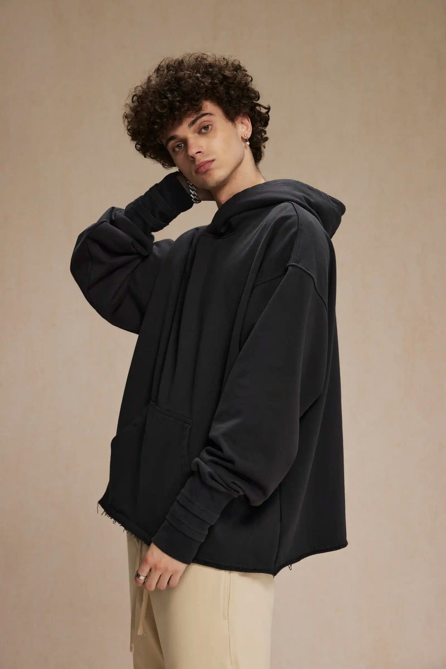 Hand-sleeve hoodie with folded threads