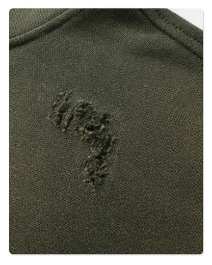 Spray-stained ink holes worn hoodie